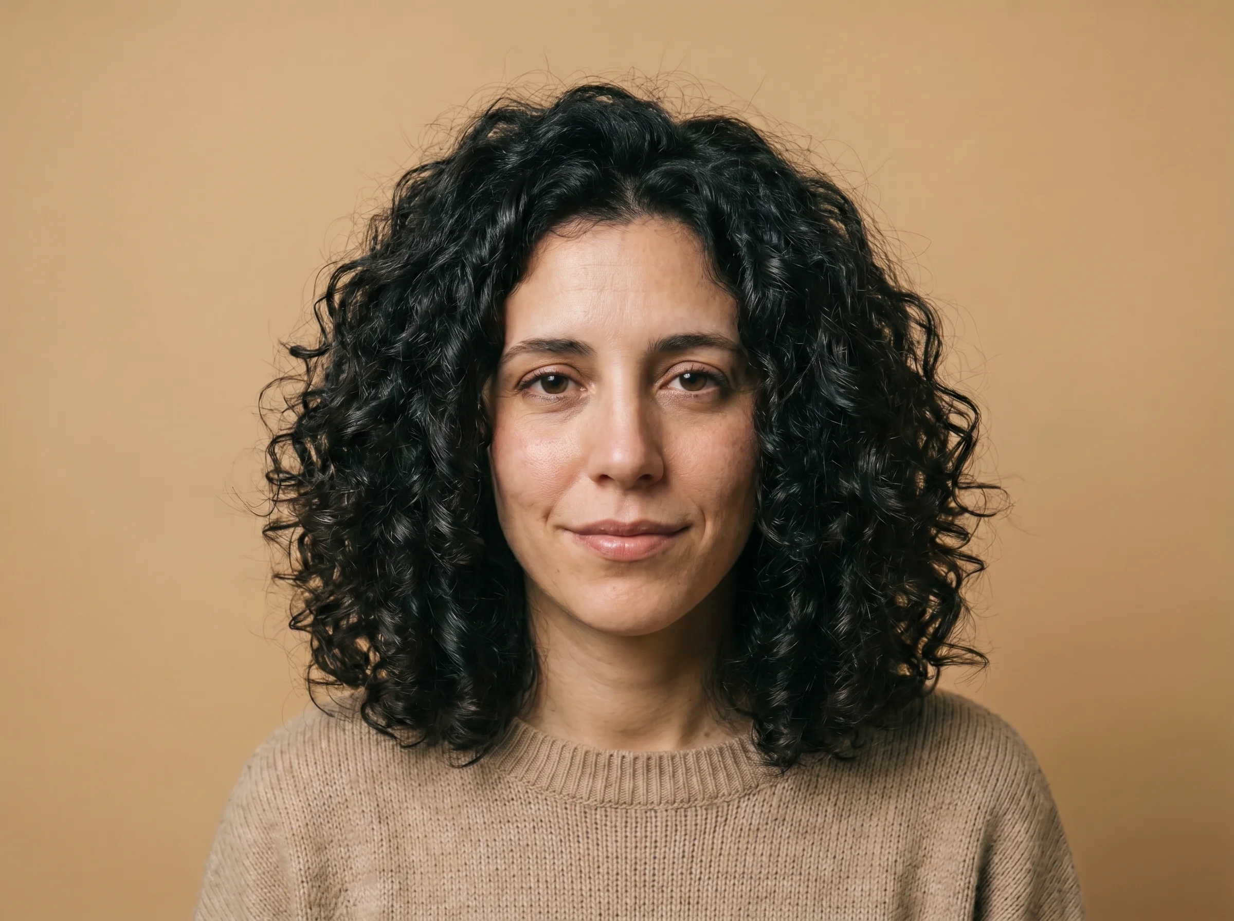Después de 12 semanas con SAVIA — rulos definidos y brillantes
